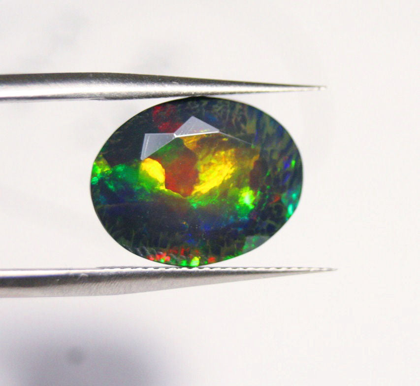 Faceted Black Welo Opal 6.9ct Floral Honeycomb Blaze AAA Ethiopian Opal 15x12mm