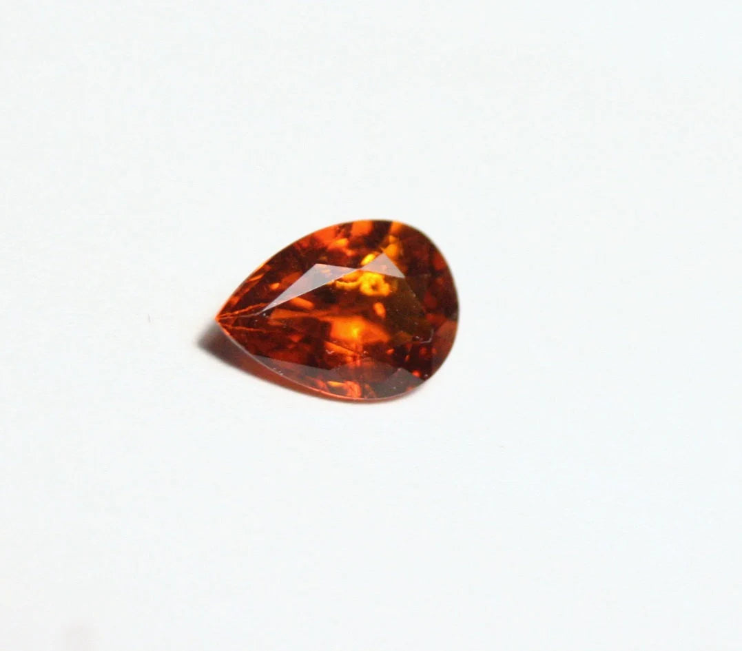 Clinohumite 0.7ct Ultra Rare Orange / Red Faceted Gem Pakistan 7x5mm