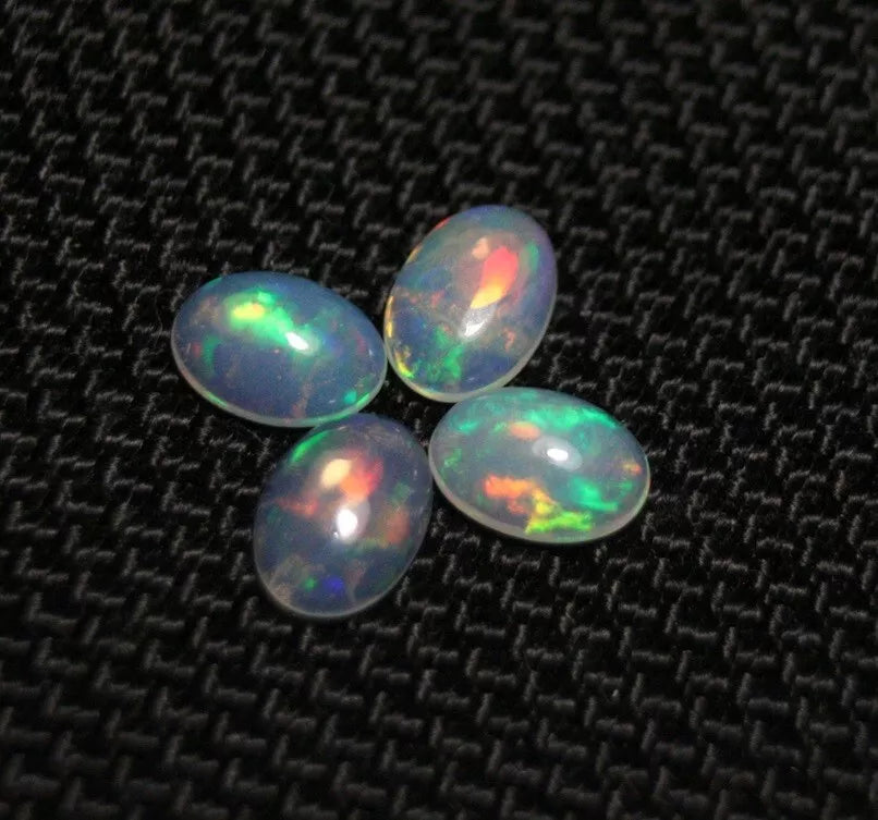 Welo Opal Cabochon Rainbow Flash 7x5mm 4pc Lot 1.49ct Natural Opal Ethiopia