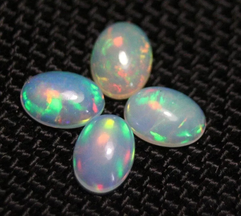 Welo Opal Cabochon Rainbow Flash 7x5mm 4pc Lot 1.76ct Natural Opal Ethiopia