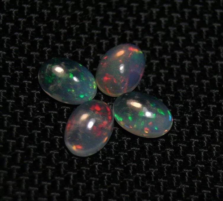 Welo Opal Cabochon Rainbow Flash 7x5mm 4pc Lot 2.27ct Natural Opal Ethiopia