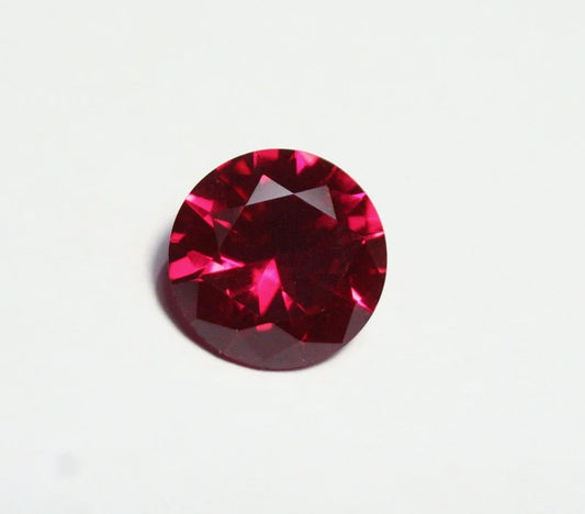 Lab Created Ruby 10mm Scintillating Precision Cut Brilliant Round AAA Swiss 4ct