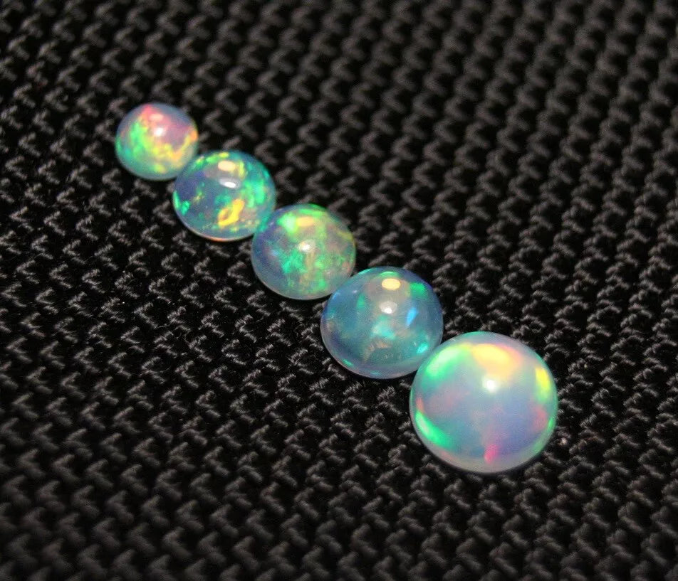 Welo Crystal Opal 4-7mm Round Cabochon Graduated 5pc Lot 2.32ct AAA Jelly Opal