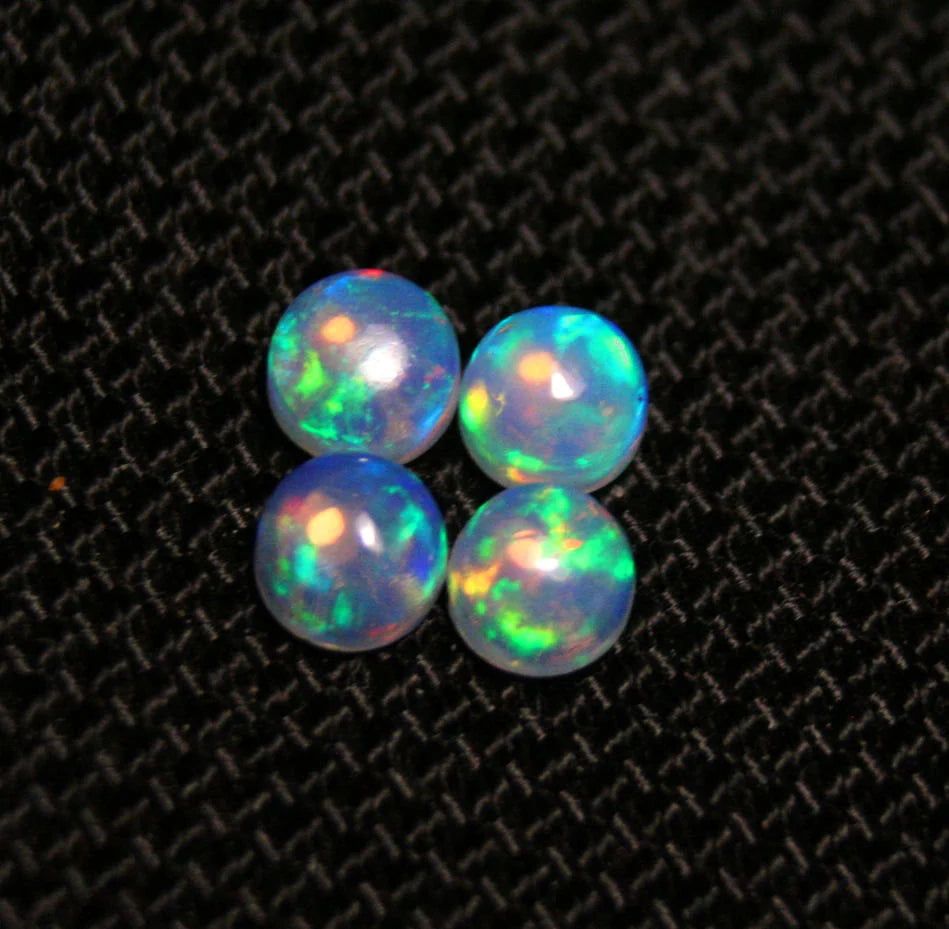 Welo Crystal Opal Round 5x5mm Rainbow Cabochons 4pc Lot 1.78ct AAA Jelly Opal