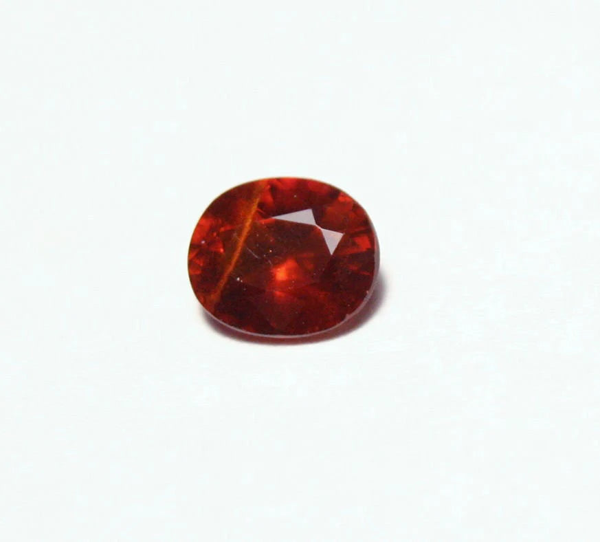 Clinohumite 0.49ct Ultra Rare Deep Orange / Red Faceted Gem - Pakistan 5x4.5mm