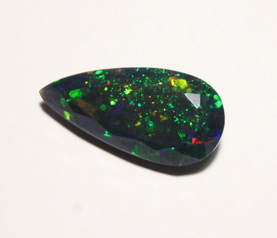 Faceted Black Welo Opal 6.1ct Honeycomb Confetti AAA Ethiopian Opal 22x11mm