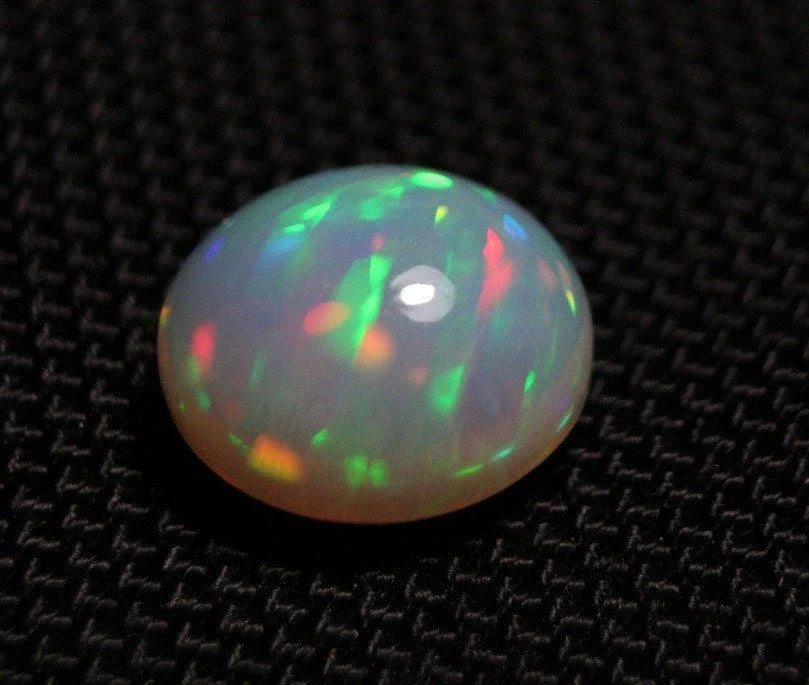 Welo Grey Base Opal Cabochon 7.77ct Harlequin Swirl Natural Opal Ethiopia Video AAA