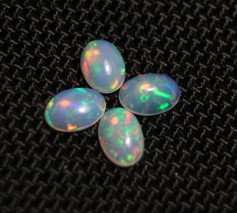 Welo Opal Cabochon 7x5mm 4pc Lot 1.72ct Lot Rainbow Ovals AAA Crystal Opal