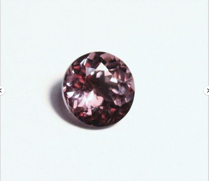 Colour Change Garnet 1.17ct Round Cut Rare Scintillating Gem Tanzania 6x6mm AAA