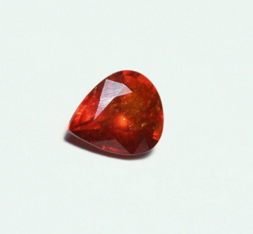 Clinohumite 0.65ct Ultra Rare Orange / Red Faceted Gem - Pakistan 6x5mm