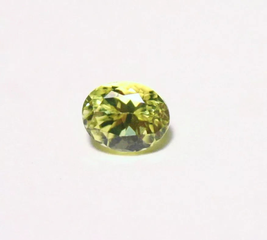 Burmese Chrysoberyl 0.69ct Rare Neon Yellow AAA Scintillating Oval Cut 5.5x4mm