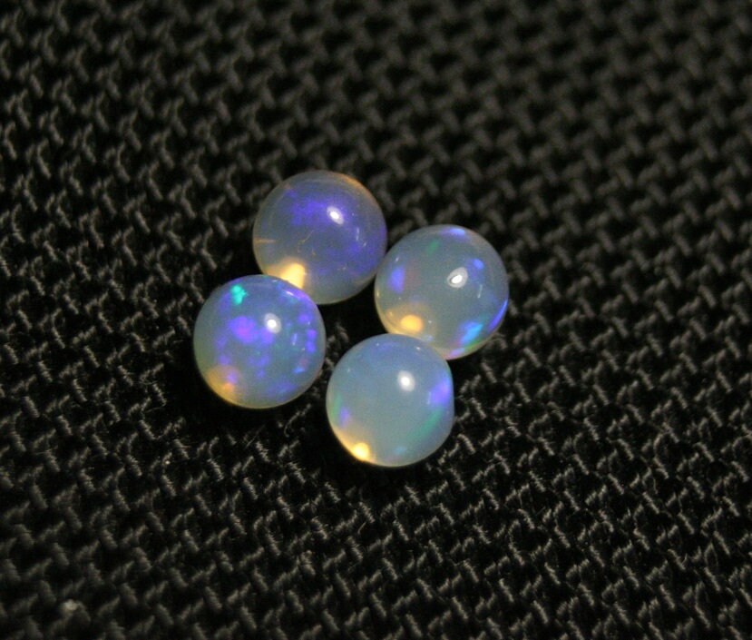 Welo Opal Crystal Ball 4pc Lot 2.6ct Neon Spheres Natural Ethiopian Opal 5x5mm