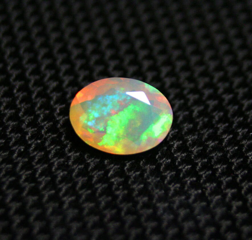 Faceted Welo Opal 1.27ct Rainbow Neon Haze Natural Ethiopian Opal 9x7mm Video AAA