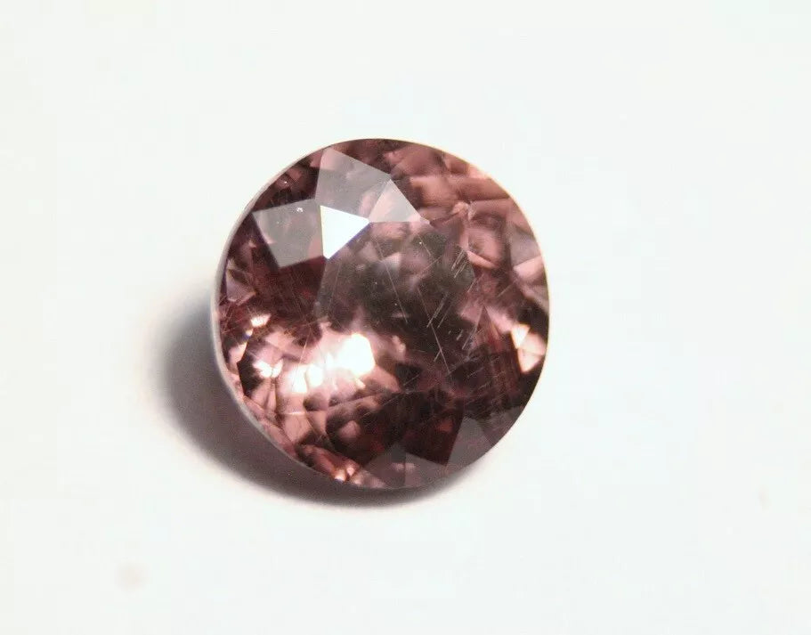 Colour Change Garnet 1.5ct Round Cut Gem with Rare Colour Change Tanzania 6x6mm