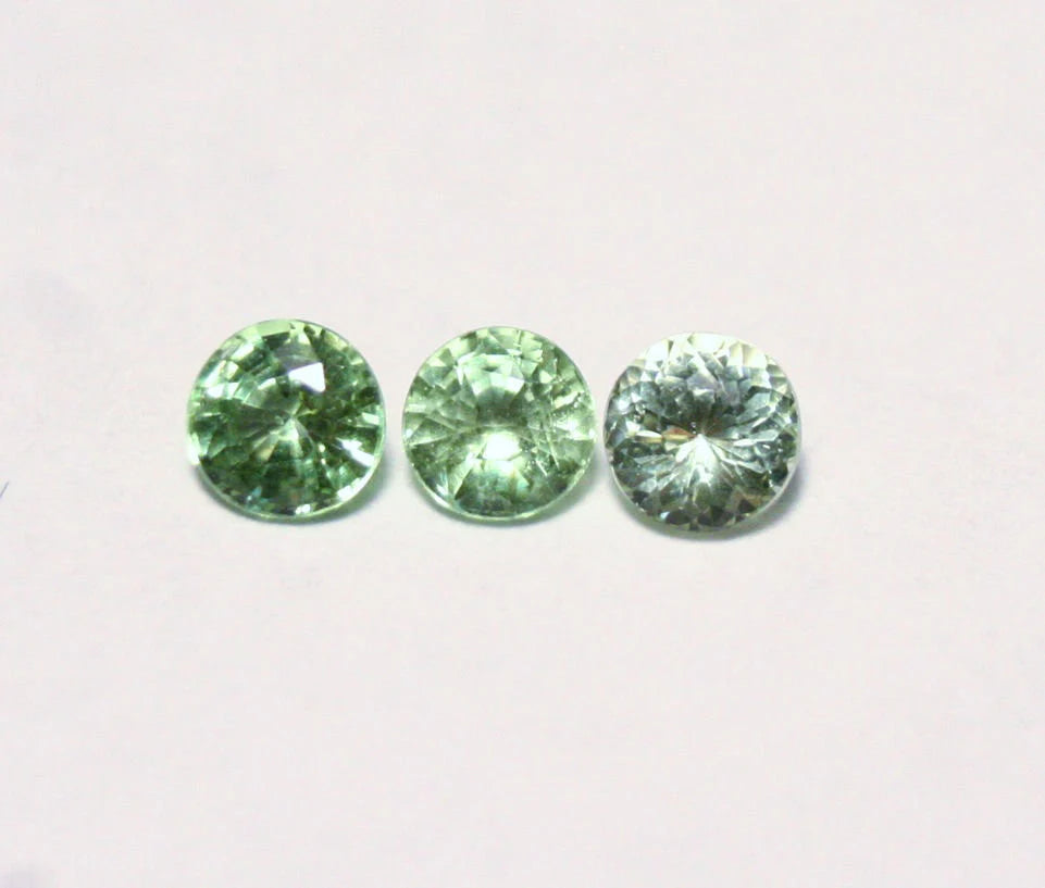 Merelani Mint Grossular Garnet 3pc lot 0.7ct Rare Faceted Fluorescent Exceptional Gem Lot 3.5mm