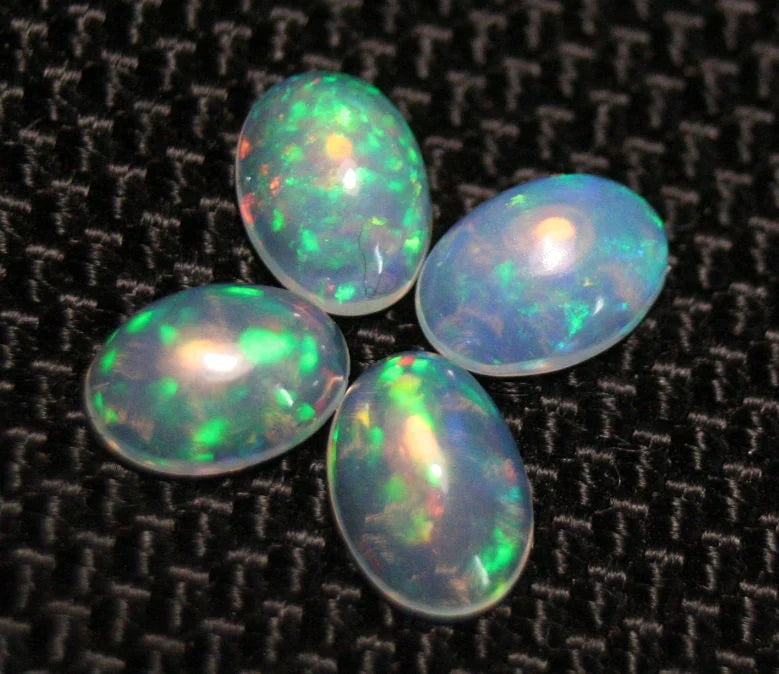 Welo Opal Cabochon 7x5mm 4pc Lot 1.74ct Lot Rainbow Ovals AAA Crystal Opal