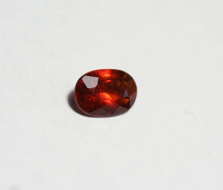 Clinohumite 0.56ct Ultra Rare Deep Orange / Red Faceted Gem - Pakistan 6x4mm