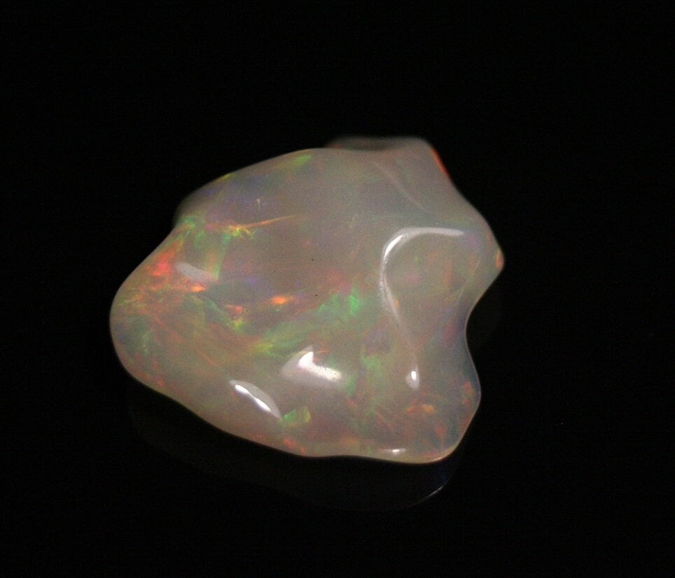 Welo Hand Carved Crystal Opal 6.7ct Neon Rainbow AAA Jelly Opal - See Video