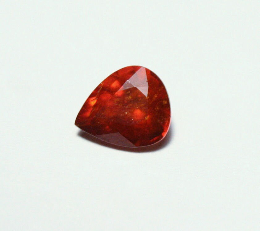 Clinohumite 0.65ct Ultra Rare Orange / Red Faceted Gem - Pakistan 6x5mm