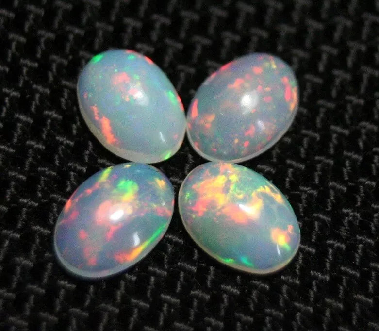 Welo Opal Cabochon Rainbow Flash 7x5mm 4pc Lot 1.72ct Natural Opal Ethiopia