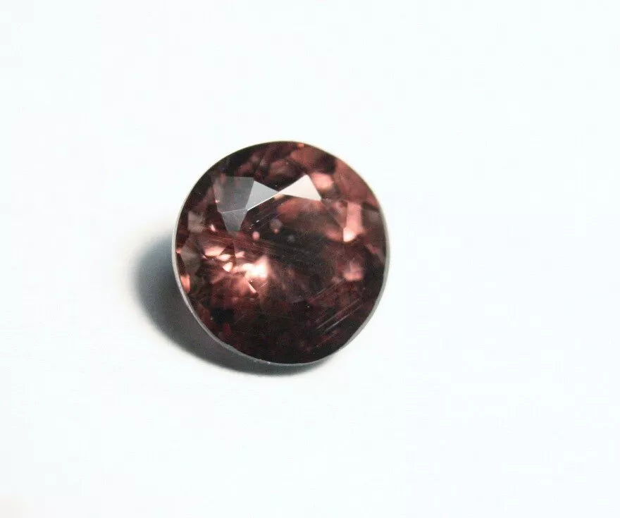 Colour Change Garnet 1.69ct Round Cut Gem with Rare Colour Change Tanzania 6x6mm