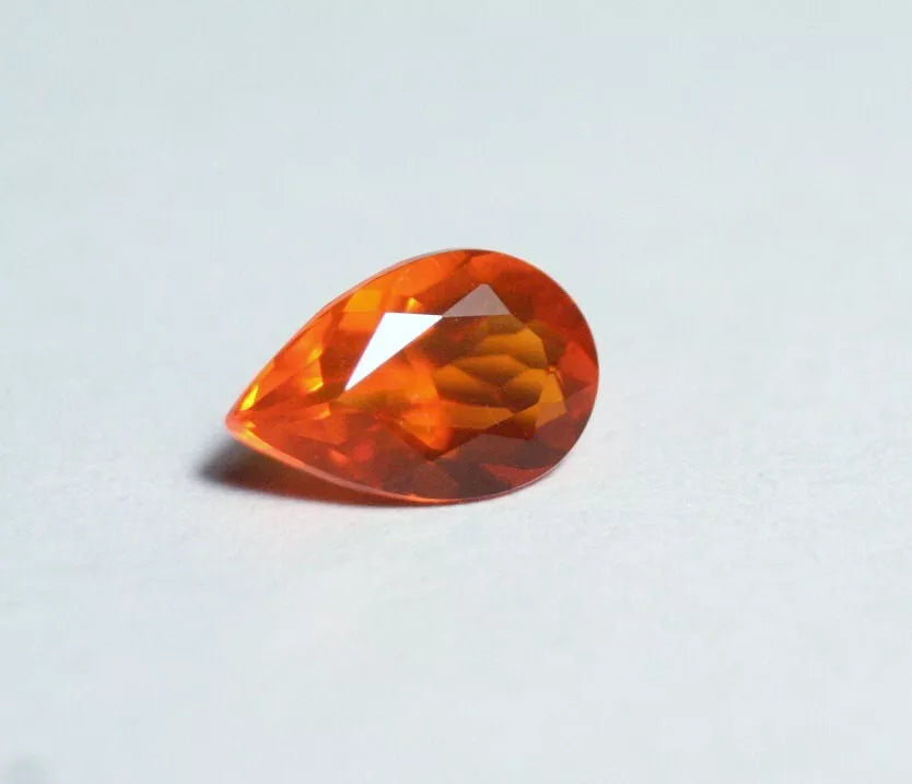 Faceted Orange Mexican Fire Opal 0.65ct Pear Cut Natural Opalescent 8x5mm