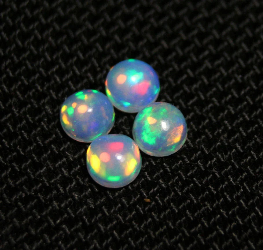 Welo Crystal Opal Round 5x5mm Rainbow Cabochons 4pc Lot 1.35ct AAA Jelly Opal