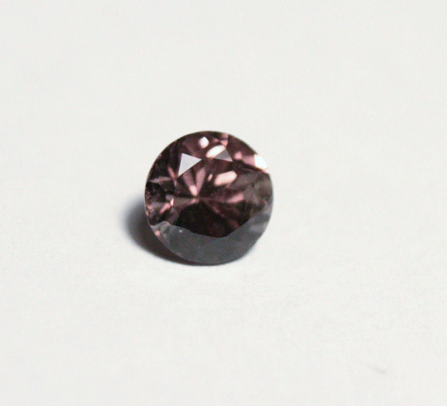 Colour Change Garnet 0.83ct Round Cut Fine Gem Rare Superb Colour Change 5x5mm