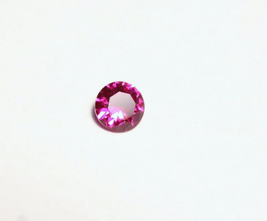 Lab Created Ruby 5x5mm Precision Cut Brilliant Round AAA - Swiss Origin