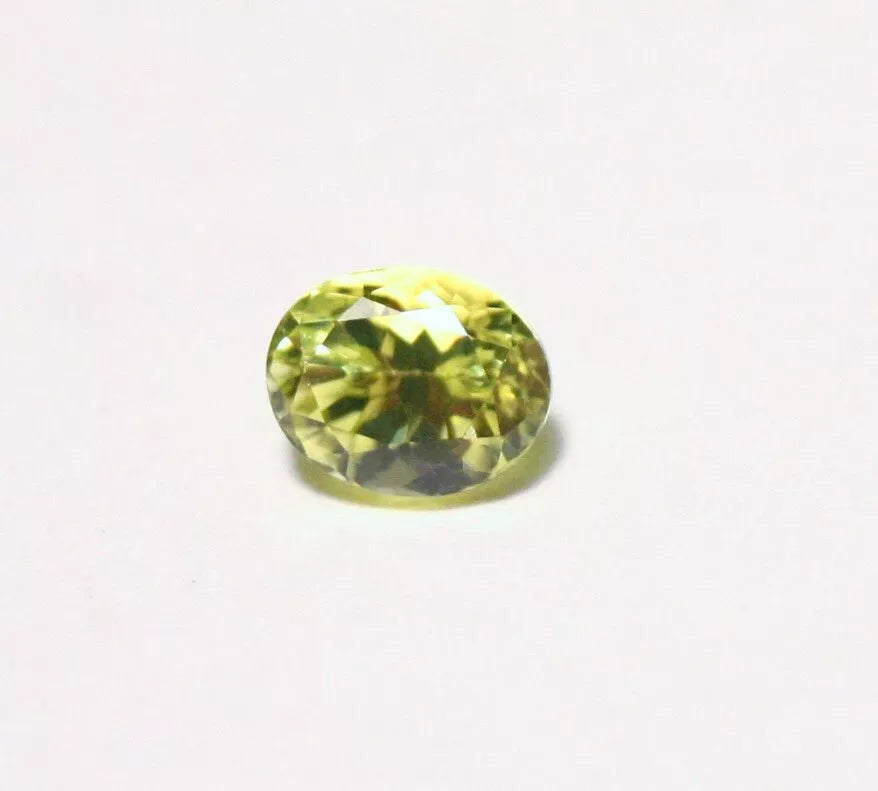 Burmese Chrysoberyl 0.69ct Rare Neon Yellow AAA Scintillating Oval Cut 5.5x4mm