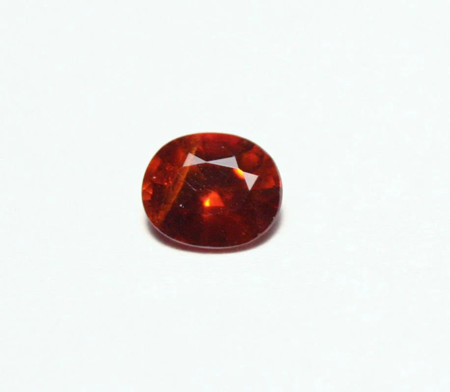 Clinohumite 0.49ct Ultra Rare Deep Orange / Red Faceted Gem - Pakistan 5x4.5mm