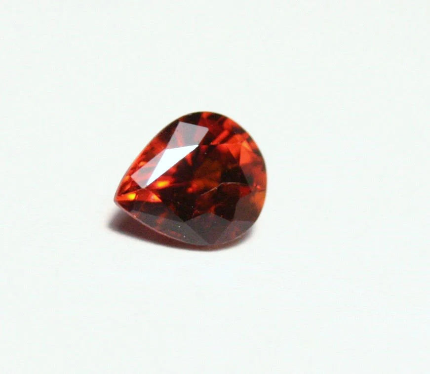 Clinohumite 0.66ct Ultra Rare Orange / Red Faceted Gem - Pakistan 6x5mm