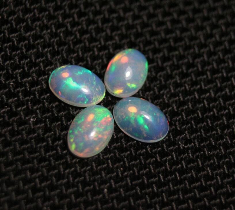 Welo Opal Cabochon 7x5mm 4pc Lot 1.72ct Lot Rainbow Ovals AAA Crystal Opal