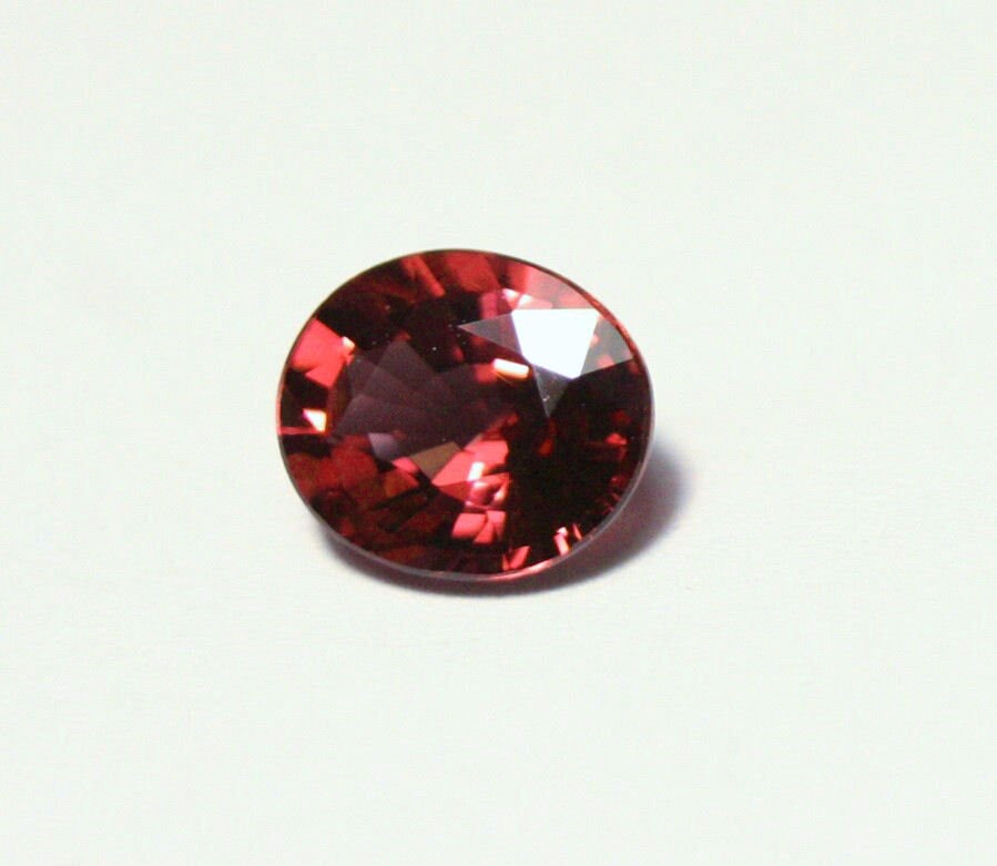 Rare Purplish Orange Malaya Colour Change Garnet 1.32ct Scintillating Oval Cut Madagascar