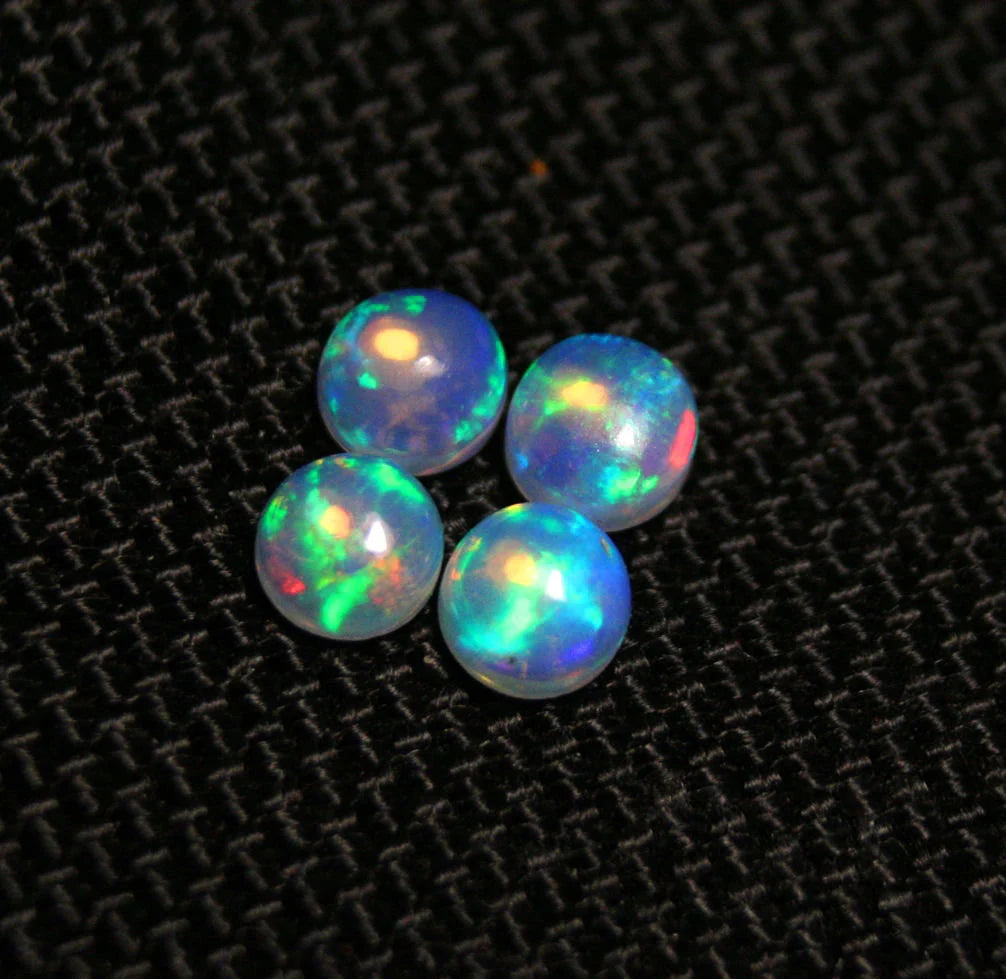 Welo Crystal Opal Round 5x5mm Rainbow Cabochons 4pc Lot 1.78ct AAA Jelly Opal