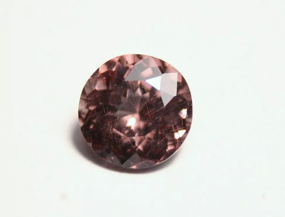 Colour Change Garnet 1.5ct Round Cut Gem with Rare Colour Change Tanzania 6x6mm