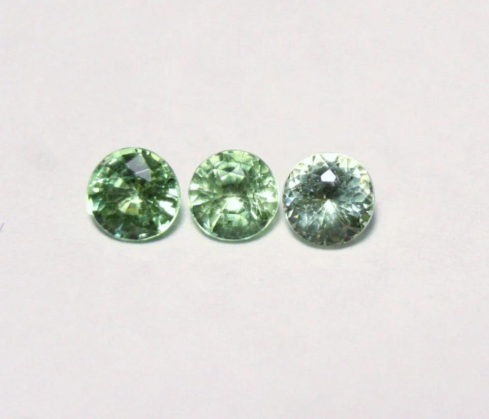 Merelani Mint Grossular Garnet 3pc lot 0.7ct Rare Faceted Fluorescent Exceptional Gem Lot 3.5mm