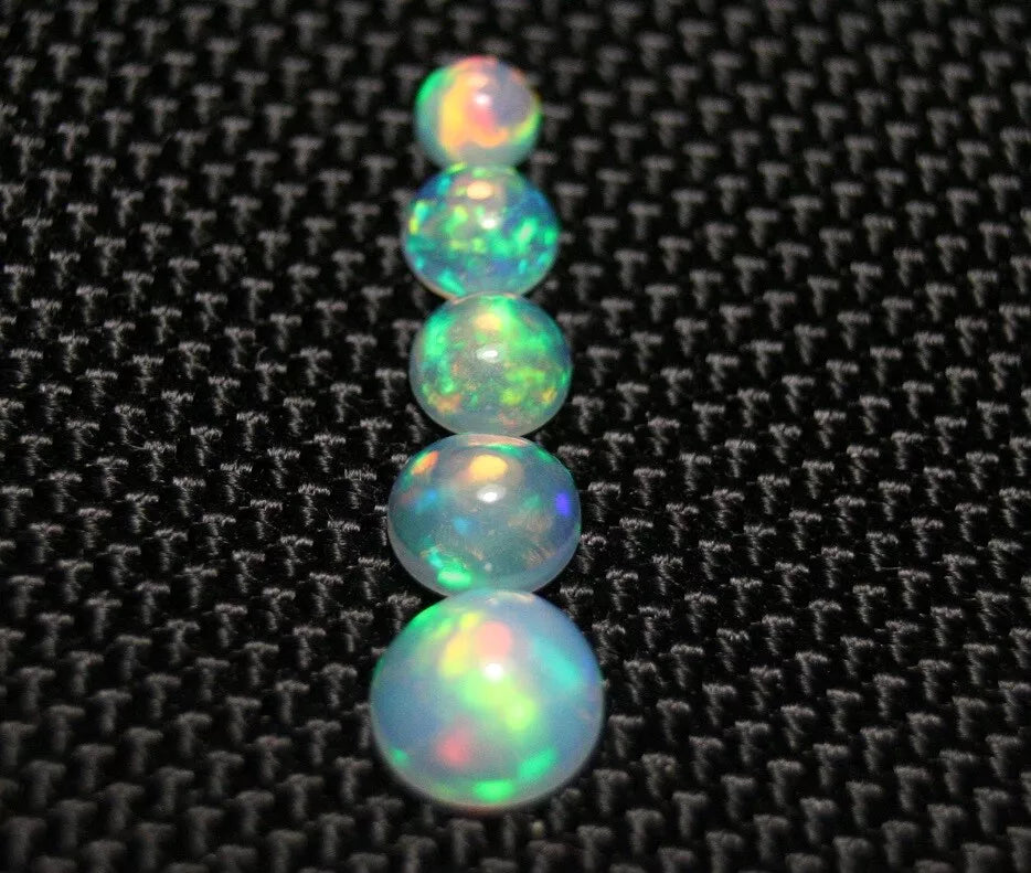 Welo Crystal Opal 4-7mm Round Cabochon Graduated 5pc Lot 2.32ct AAA Jelly Opal