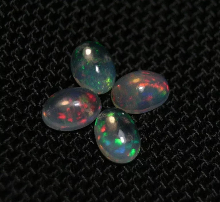 Welo Opal Cabochon Rainbow Flash 7x5mm 4pc Lot 2.27ct Natural Opal Ethiopia