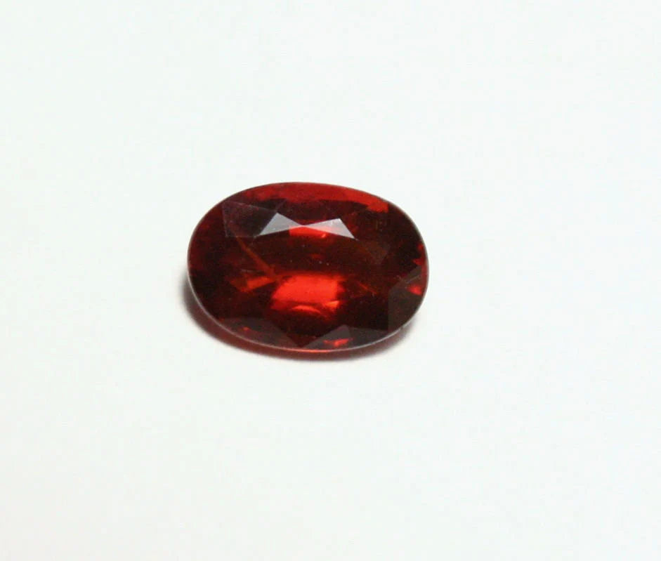 Clinohumite 0.71ct Ultra Rare Deep Orange / Red Faceted Gem - Pakistan 7x4mm