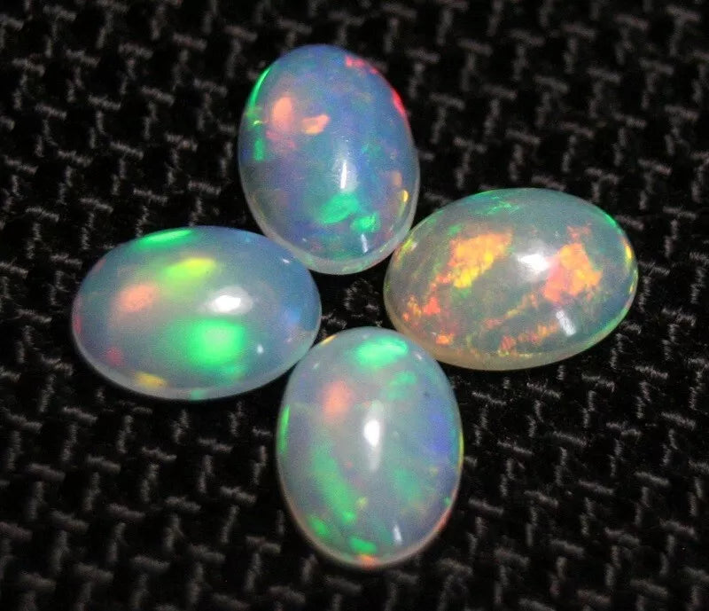 Welo Opal Cabochon Rainbow Flash 7x5mm 4pc Lot 1.76ct Natural Opal Ethiopia