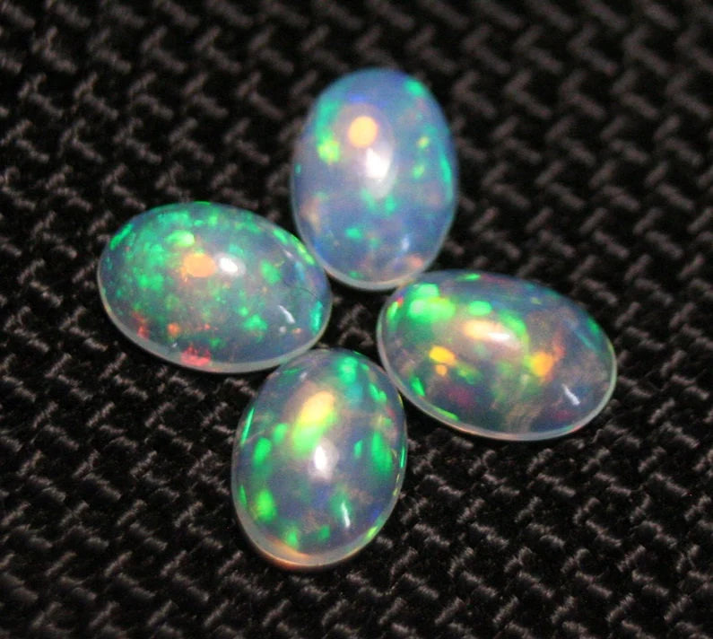 Welo Opal Cabochon 7x5mm 4pc Lot 1.74ct Lot Rainbow Ovals AAA Crystal Opal