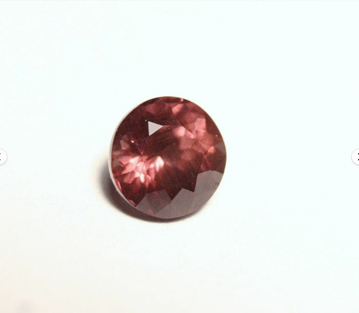 Colour Change Garnet 1.67ct Round Cut Rare Scintillating Gem Tanzania 6x6mm AAA