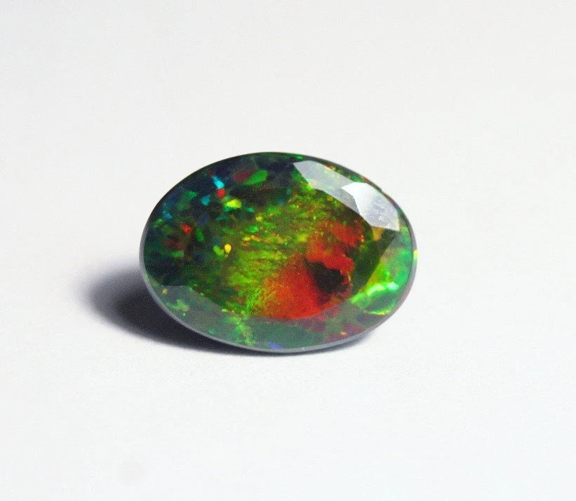 Faceted Black Welo Opal 5.24ct Rainbow Confetti AAA Natural Ethiopian Opal 13x9mm