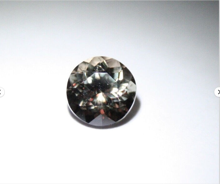 0.6ct Colour Change Garnet Round Cut Fine Gem Rare Superb Colour Change 4.5x4.5mm