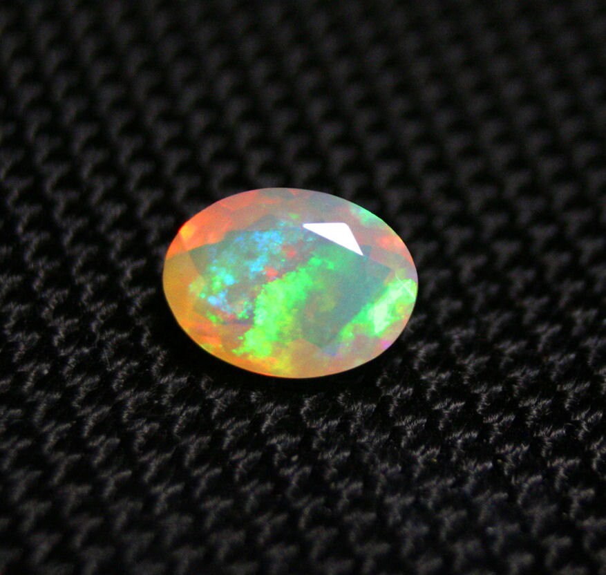 Faceted Welo Opal 1.27ct Rainbow Neon Haze Natural Ethiopian Opal 9x7mm Video AAA