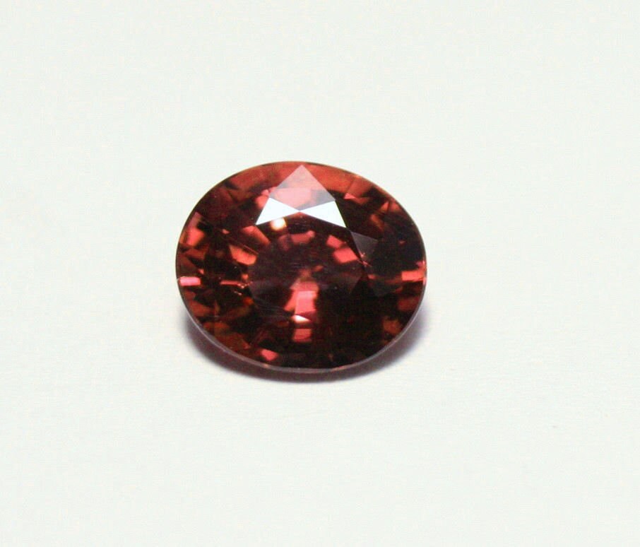 Rare Purplish Orange Malaya Colour Change Garnet 1.32ct Scintillating Oval Cut Madagascar