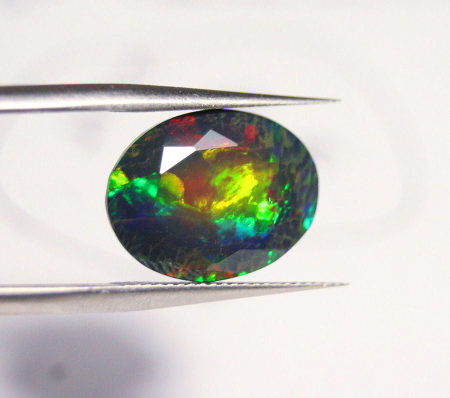 Faceted Black Welo Opal 6.9ct Floral Honeycomb Blaze AAA Ethiopian Opal 15x12mm