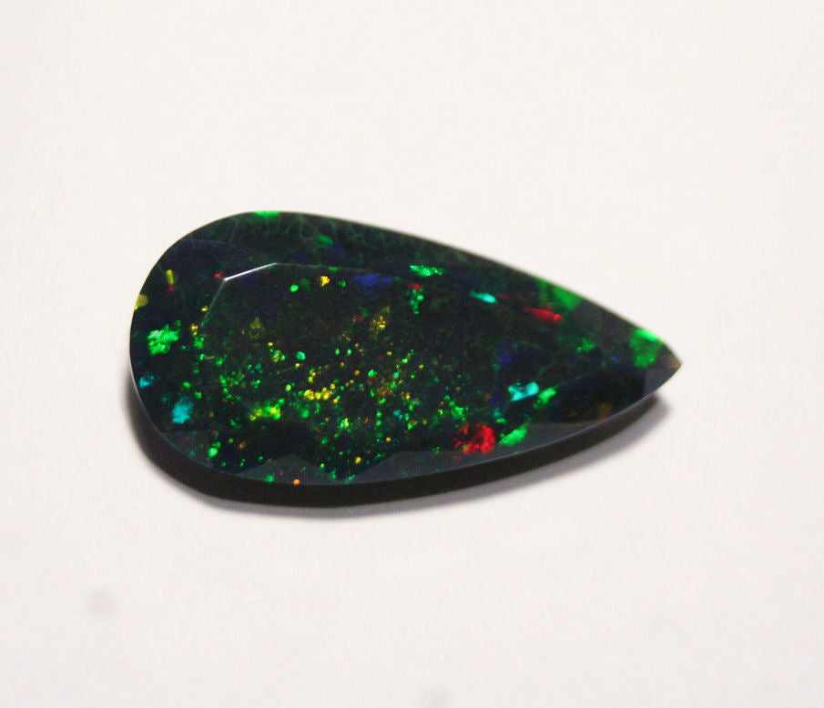 Faceted Black Welo Opal 6.1ct Honeycomb Confetti AAA Ethiopian Opal 22x11mm