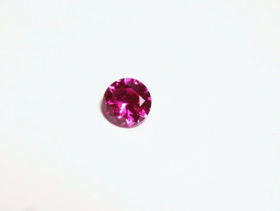 Lab Created Ruby 5x5mm Precision Cut Brilliant Round AAA - Swiss Origin